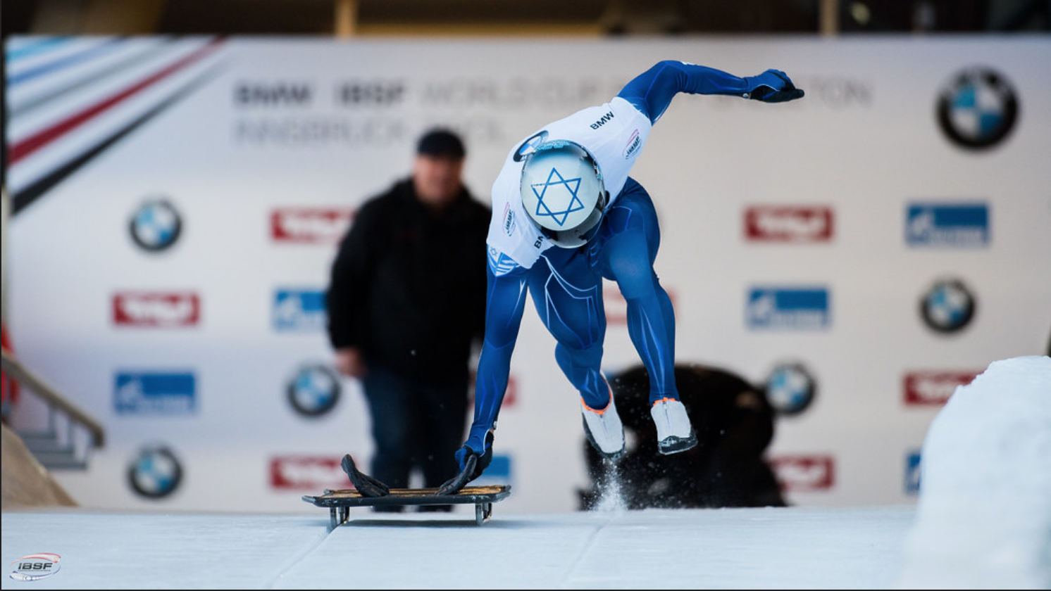 Jared Firestone launching on the skeleton track while representing Israel